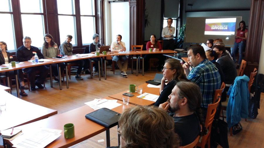 Members of CAPACOA and RIDEAU around tables in a joint meeting